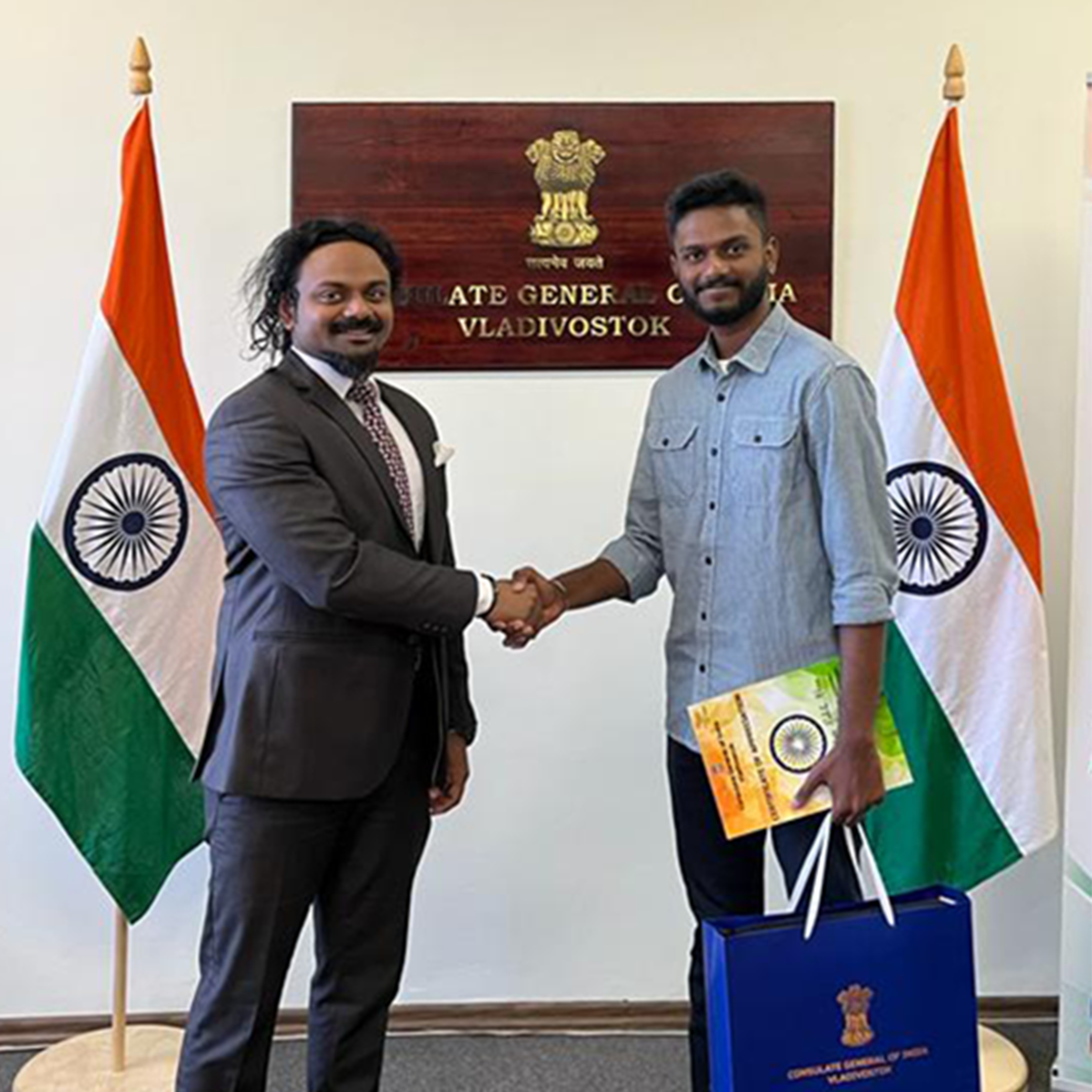 Sulfikar Rahila Khan Fazil, Founder and CEO of IGEConsultancy, shaking hands with Mr. Sai Murali S., Consul General of India in the Indian Embassy in Russia, Vladivostok.